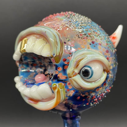 Hand blown glass monster watering globe