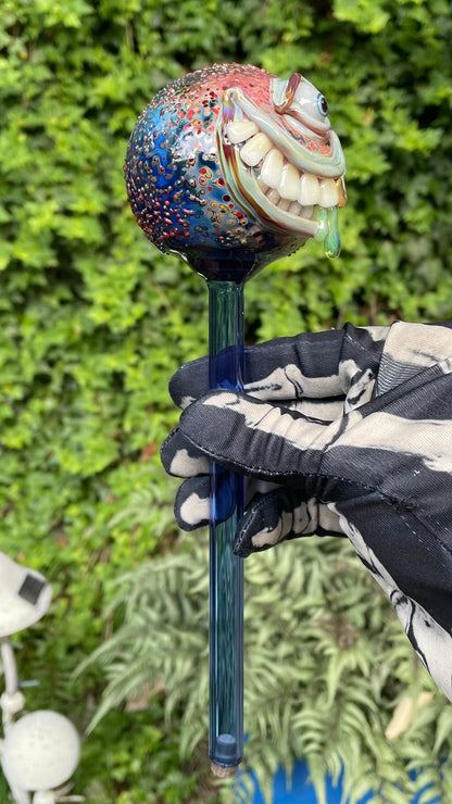 Hand blown glass monster watering globe