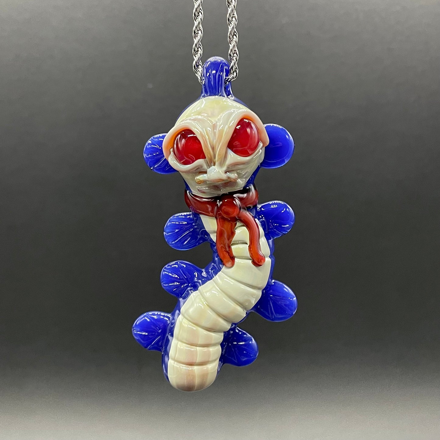 Labyrinth worm pendant detail view - premium glass art