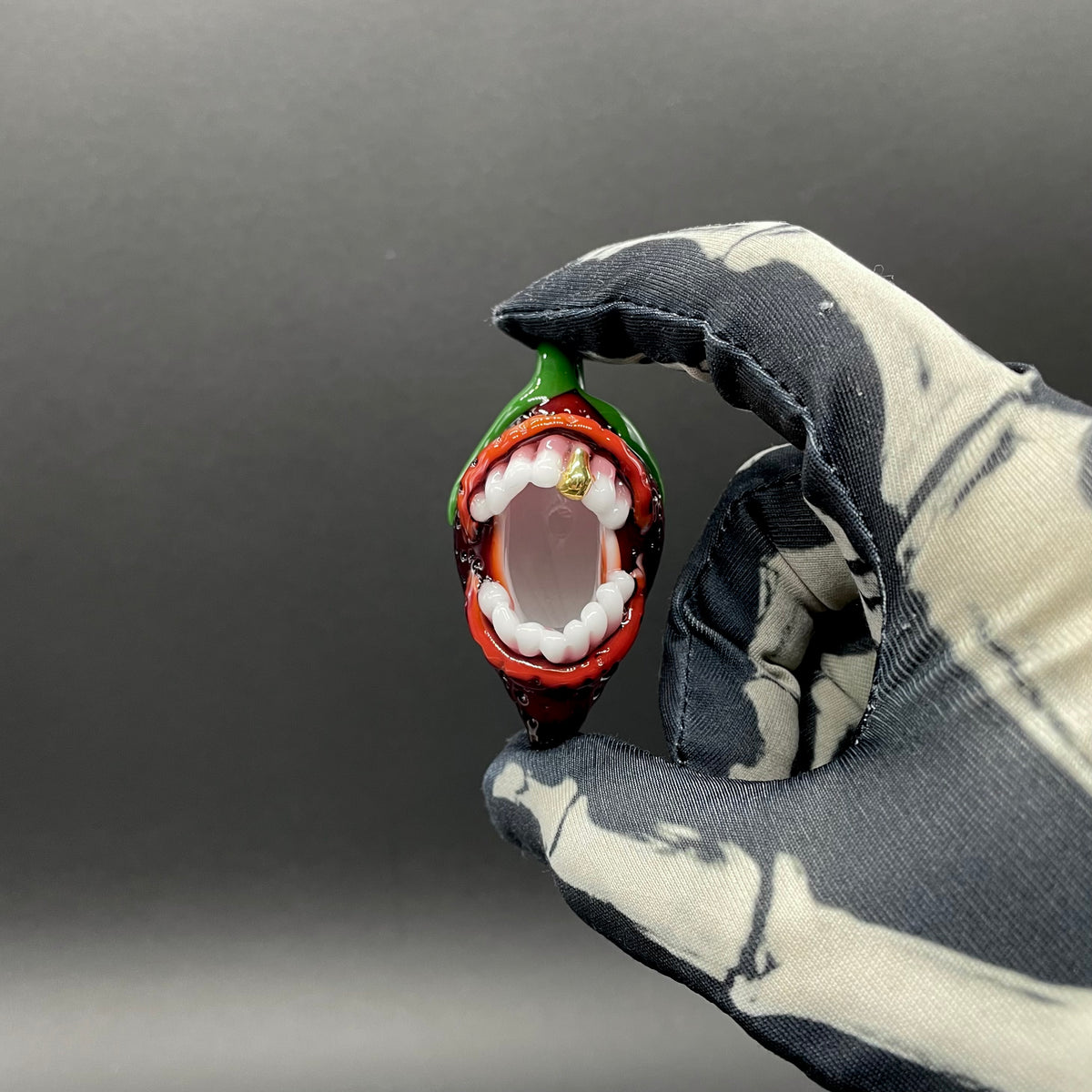 Screaming strawberry glass pendant