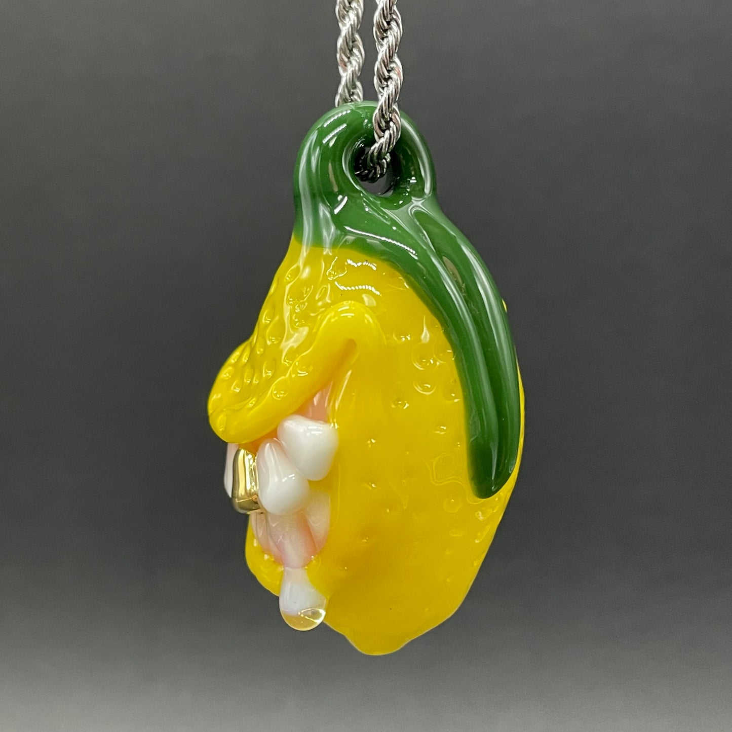 Grinning lemon pendant