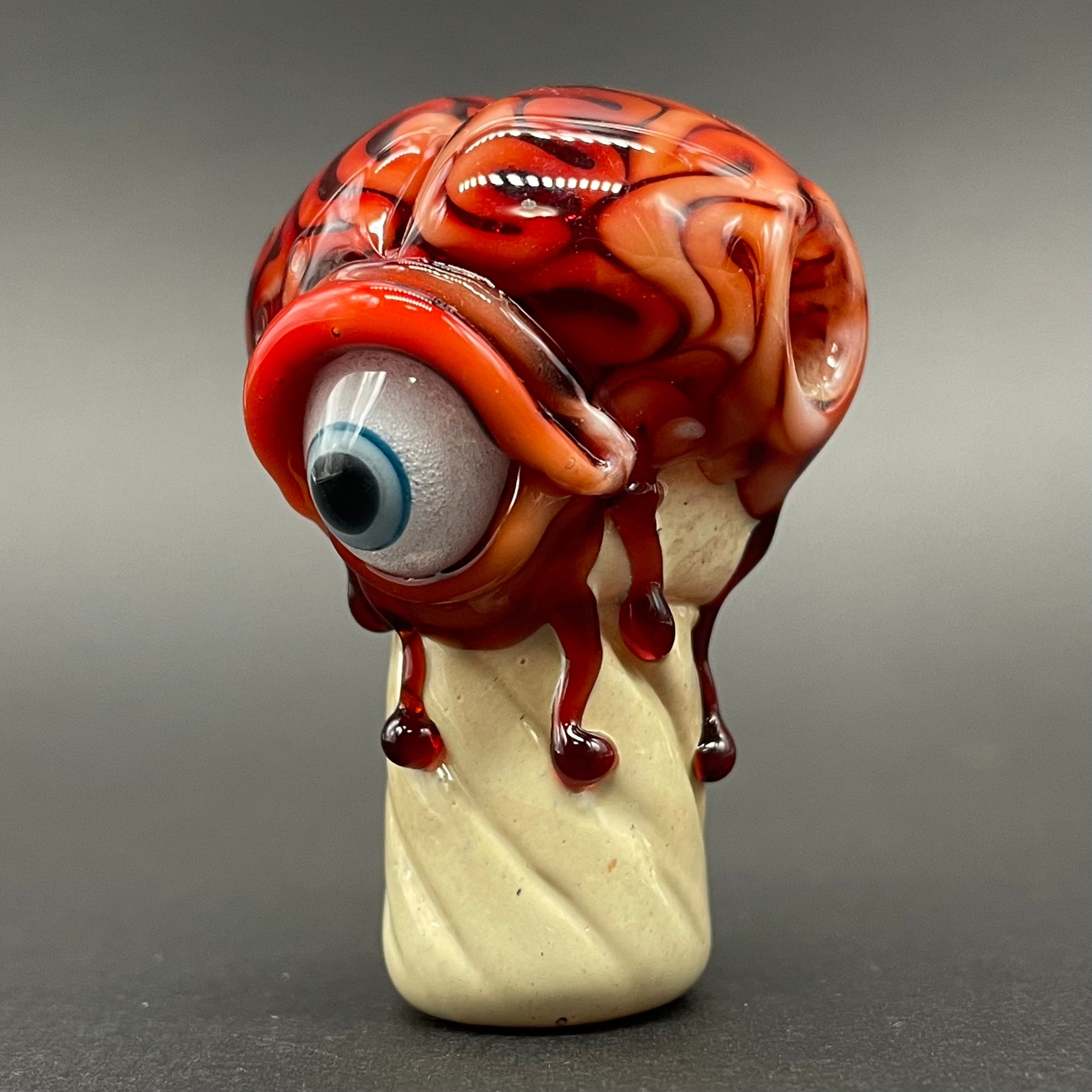 Close-up of Brain cone pendant - handcrafted glass