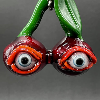 Cherry flavored glass eye pendant