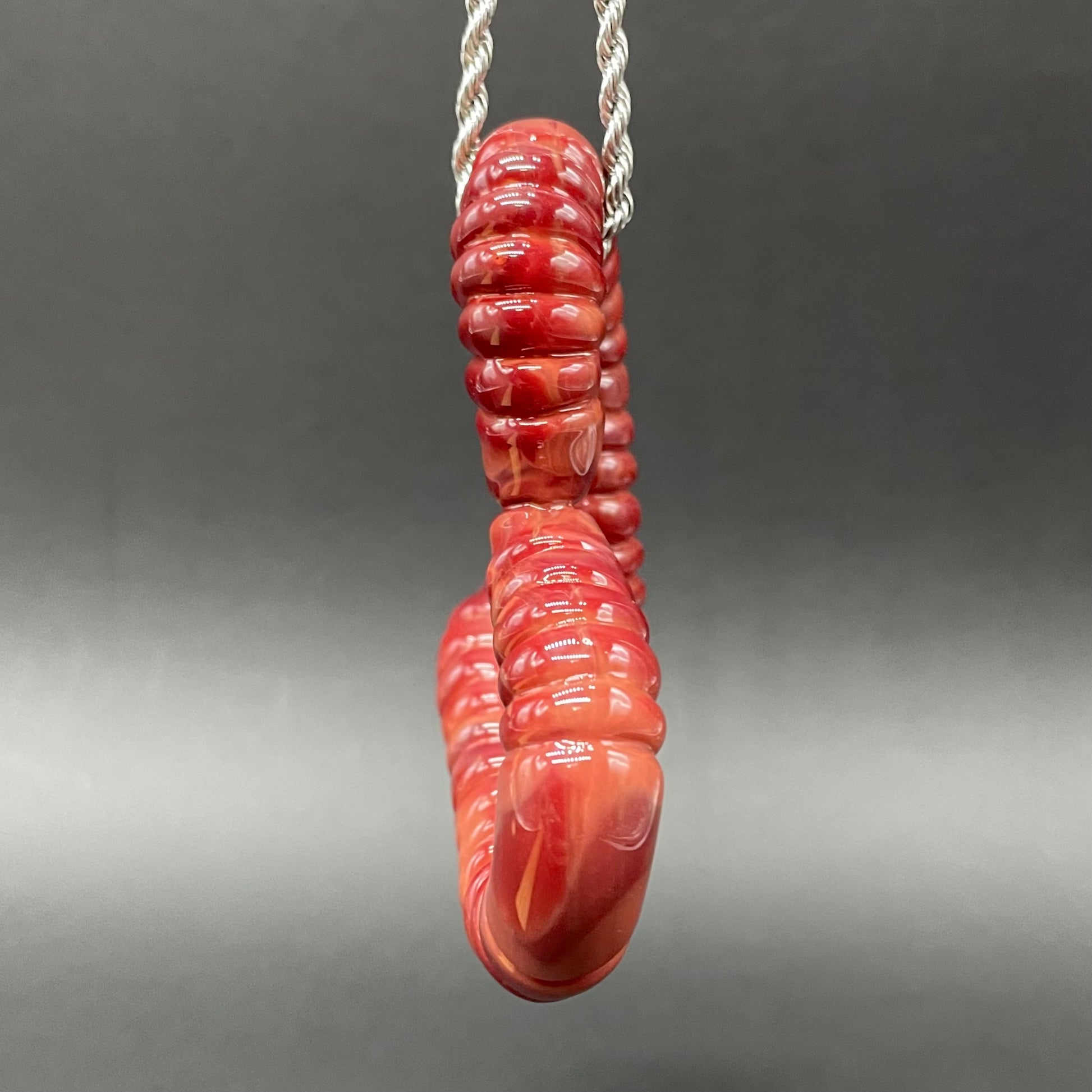 Artisan glass Large glass earthworm heart shaped pendant - detailed craftsmanship