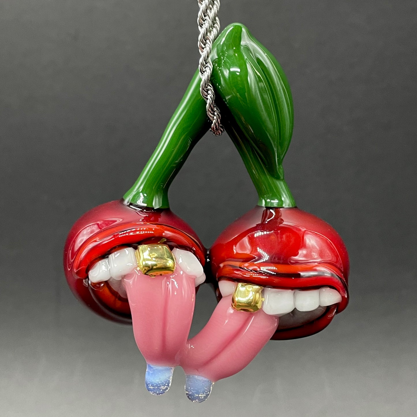 Cherry lover pendant detail view - premium glass art