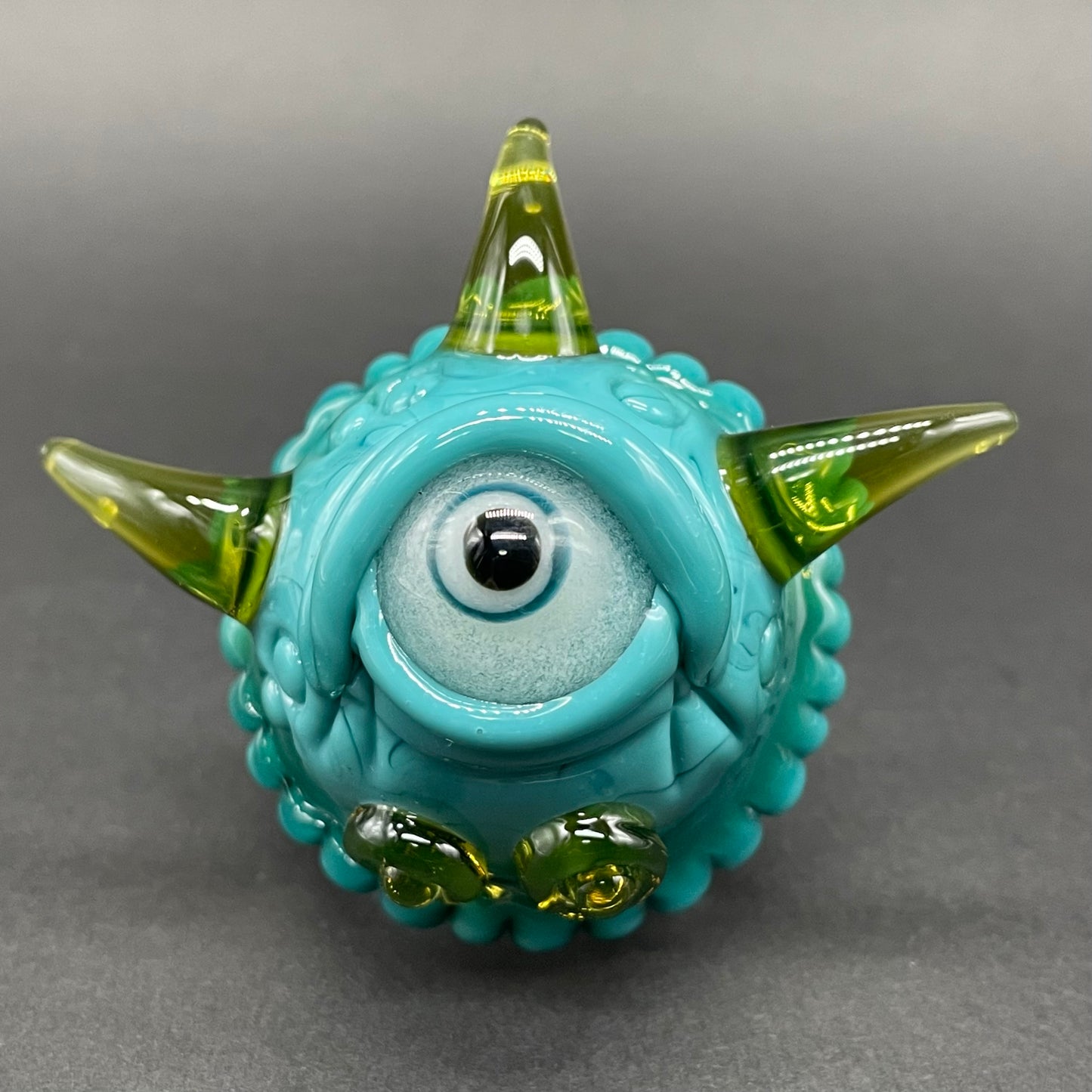 Close-up of Dicroic Cyclops marble - handcrafted glass