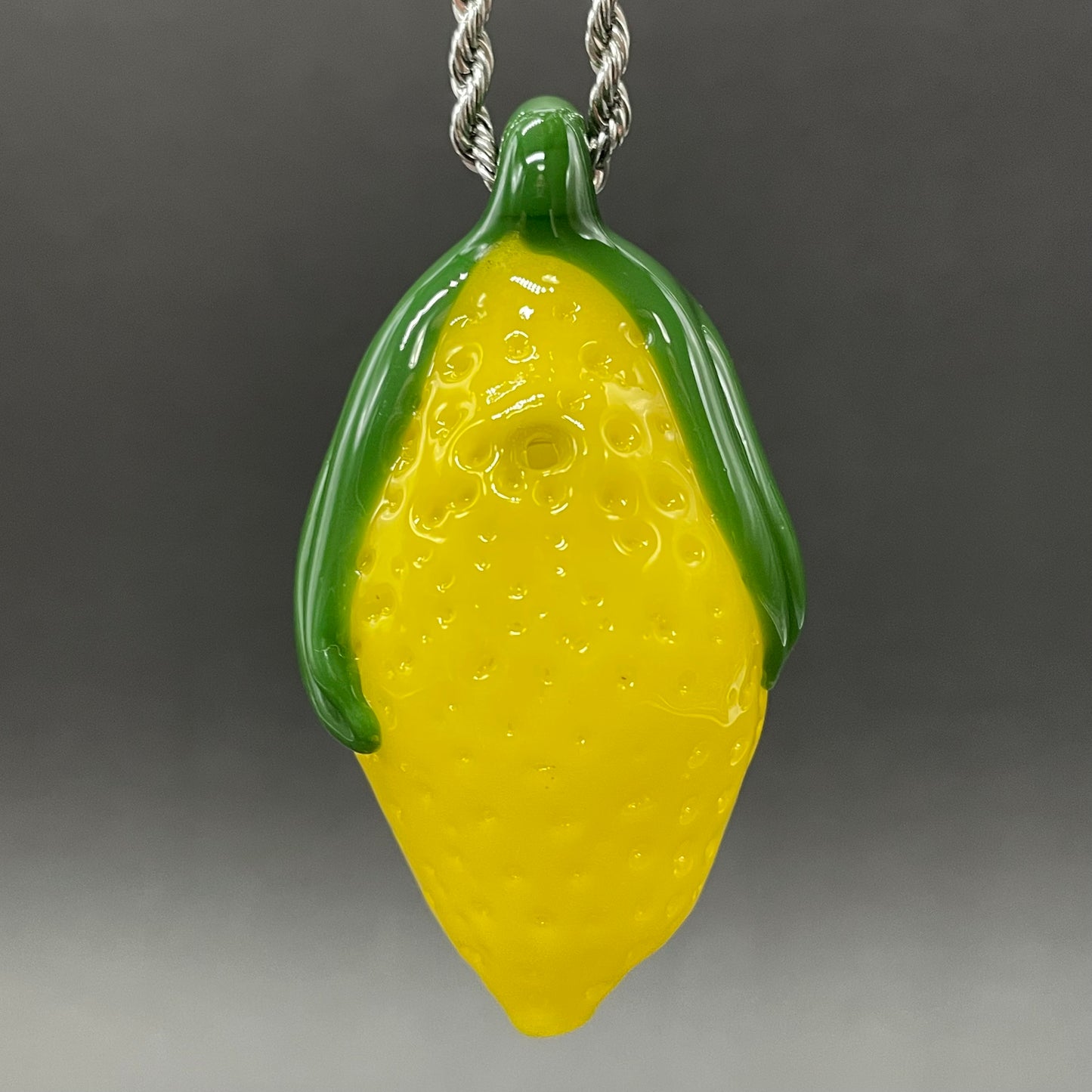 Grinning lemon pendant