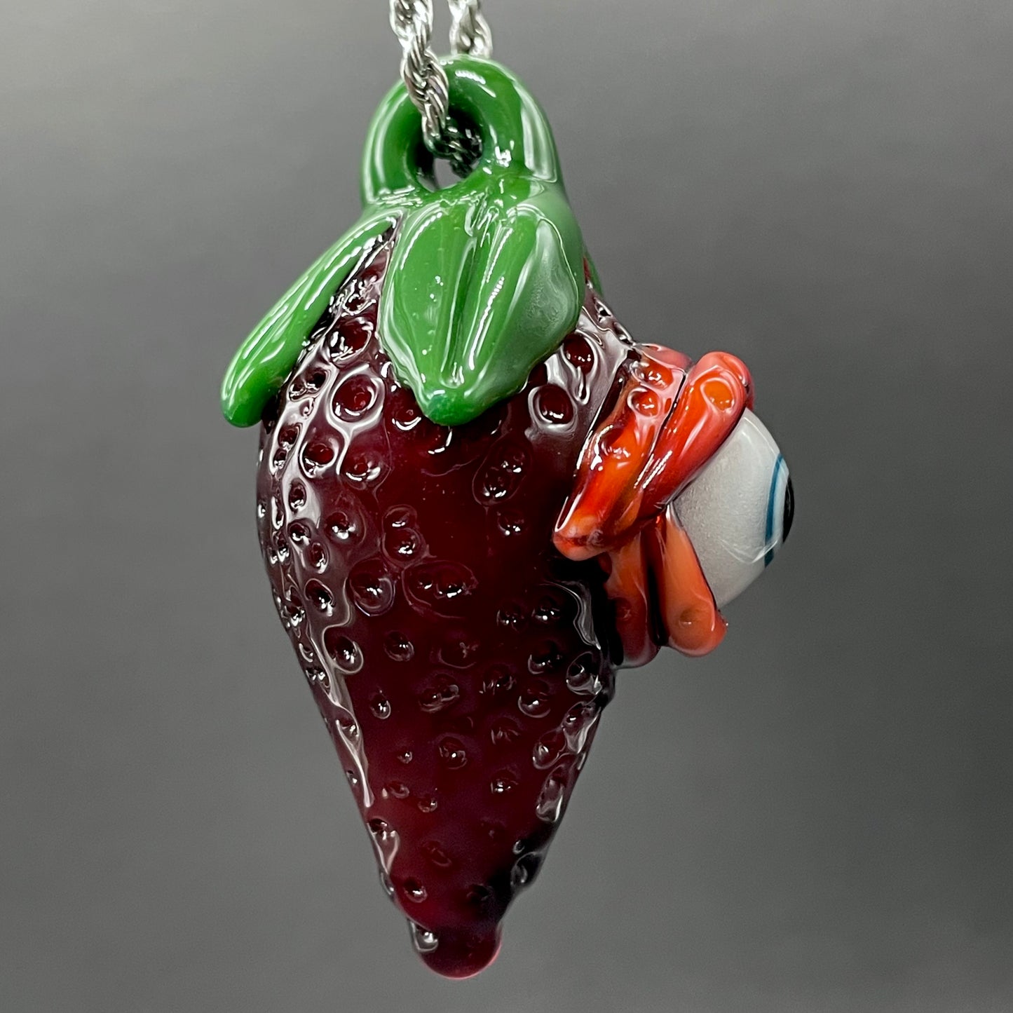 Leviathan Glass Cyclops strawberry pendant - hand-blown art