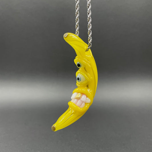 Grinning glass banana pendant