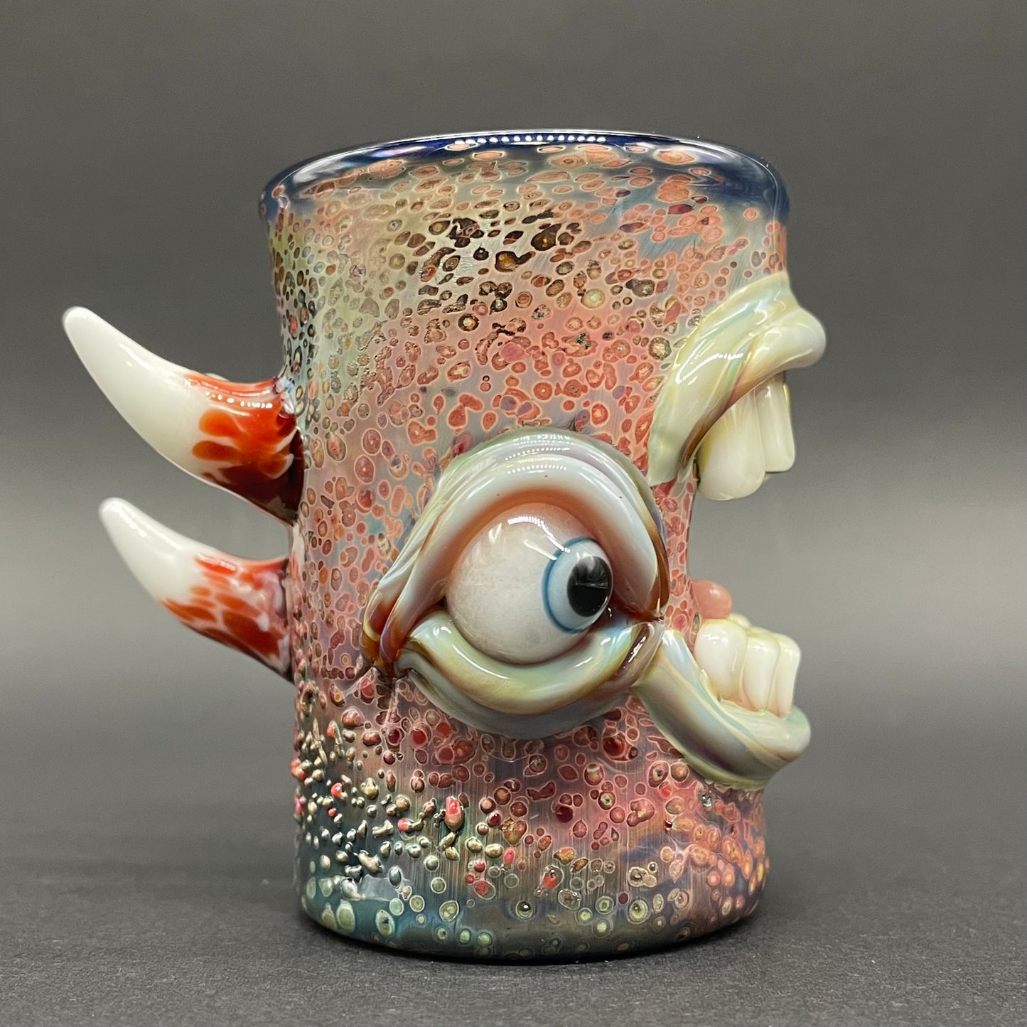 Close-up of Screaming shot glass - handcrafted glass