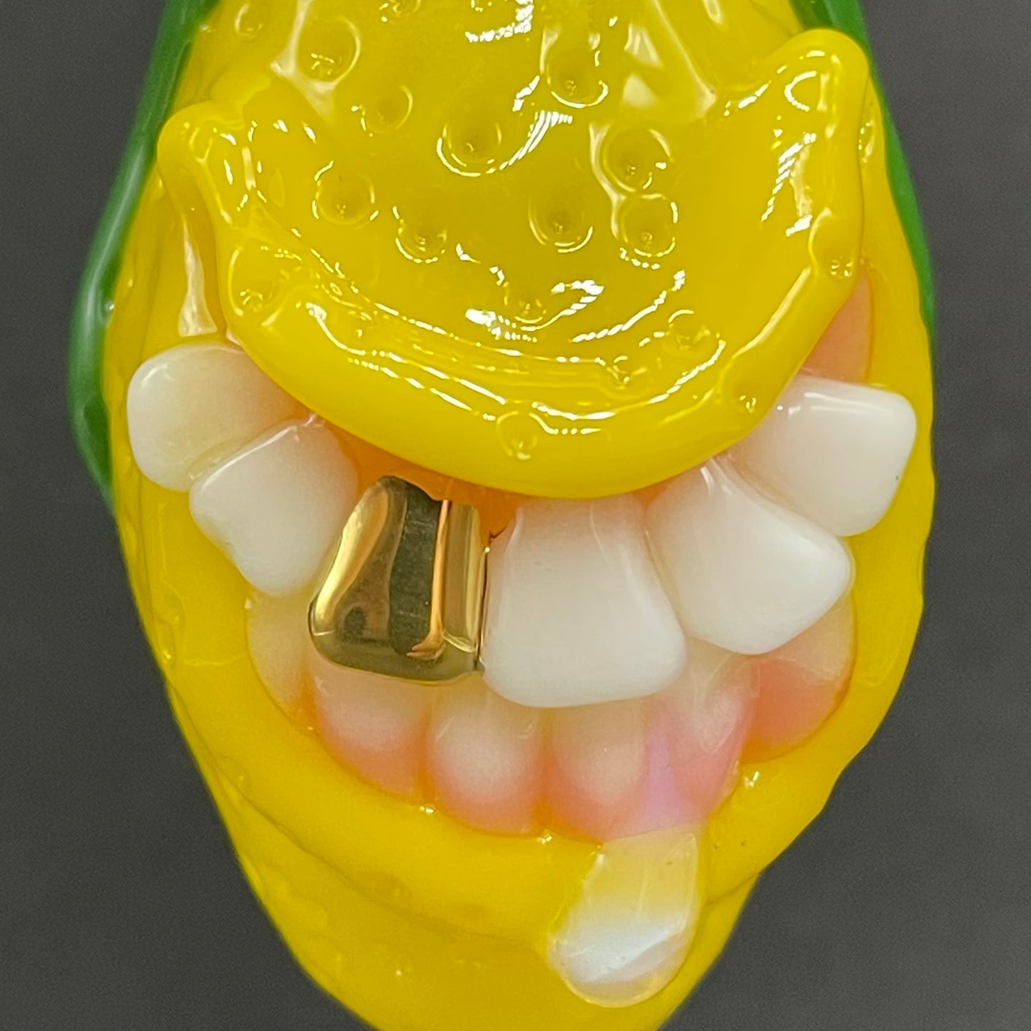 Grinning lemon pendant