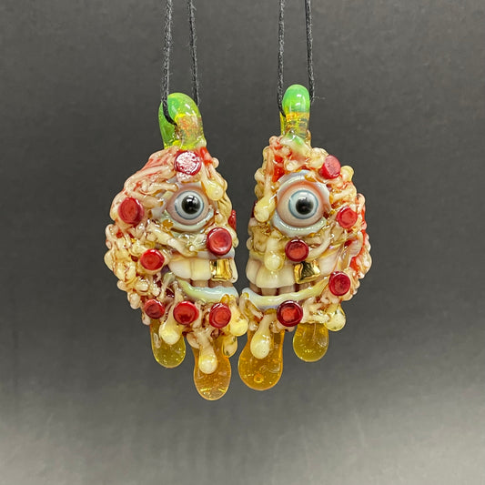 Two halves of one pizza friendship necklace detail view - premium glass art