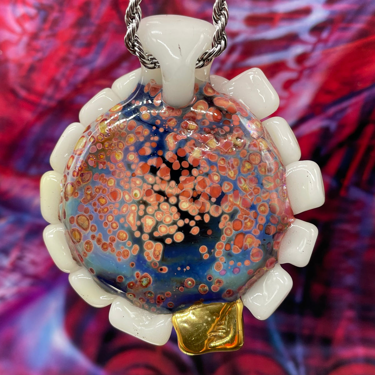 Unidentified Object Delta handblown glass pendant - circular disc ringed with ivory teeth, blue iris eye center, eyelid, gold tooth accent, silver rope chain - Leviathan Glass
