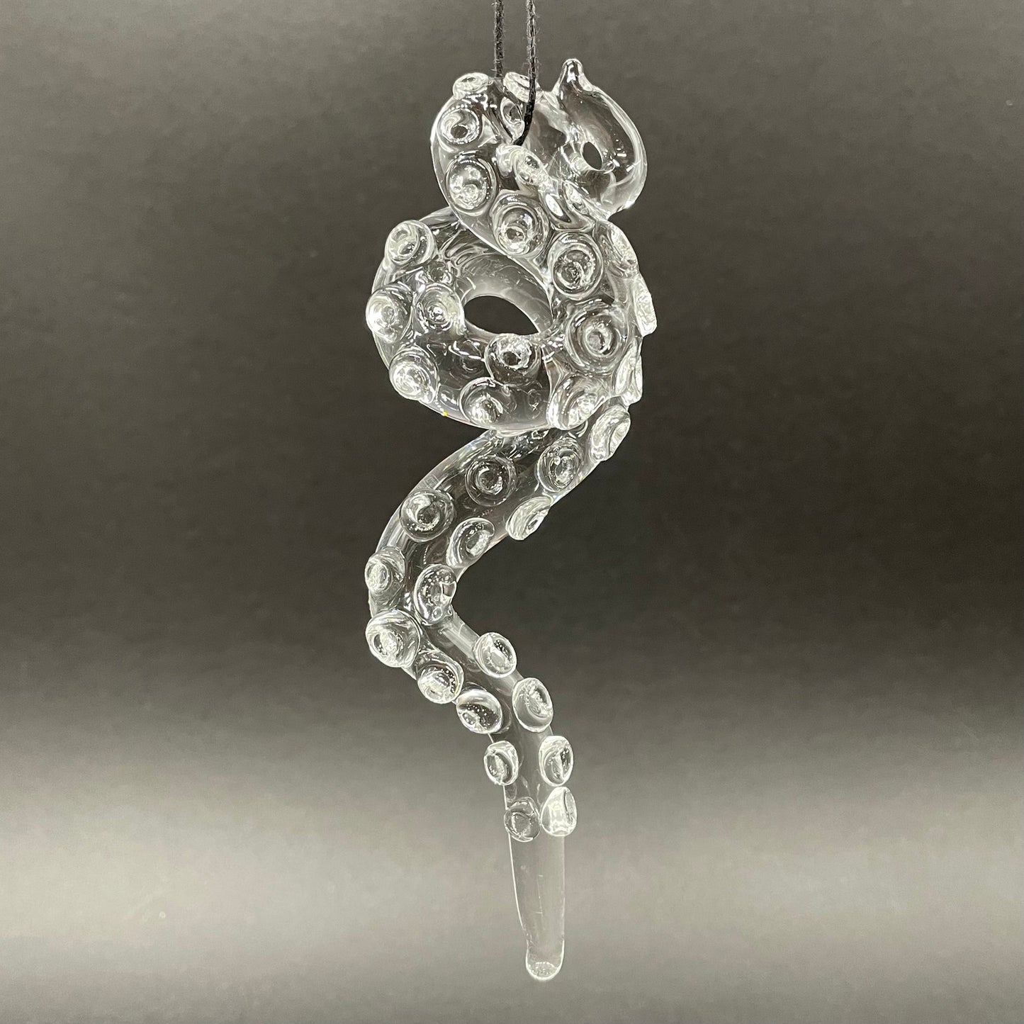 3 clear tentacle ornaments by Leviathan Glass - artisan detail
