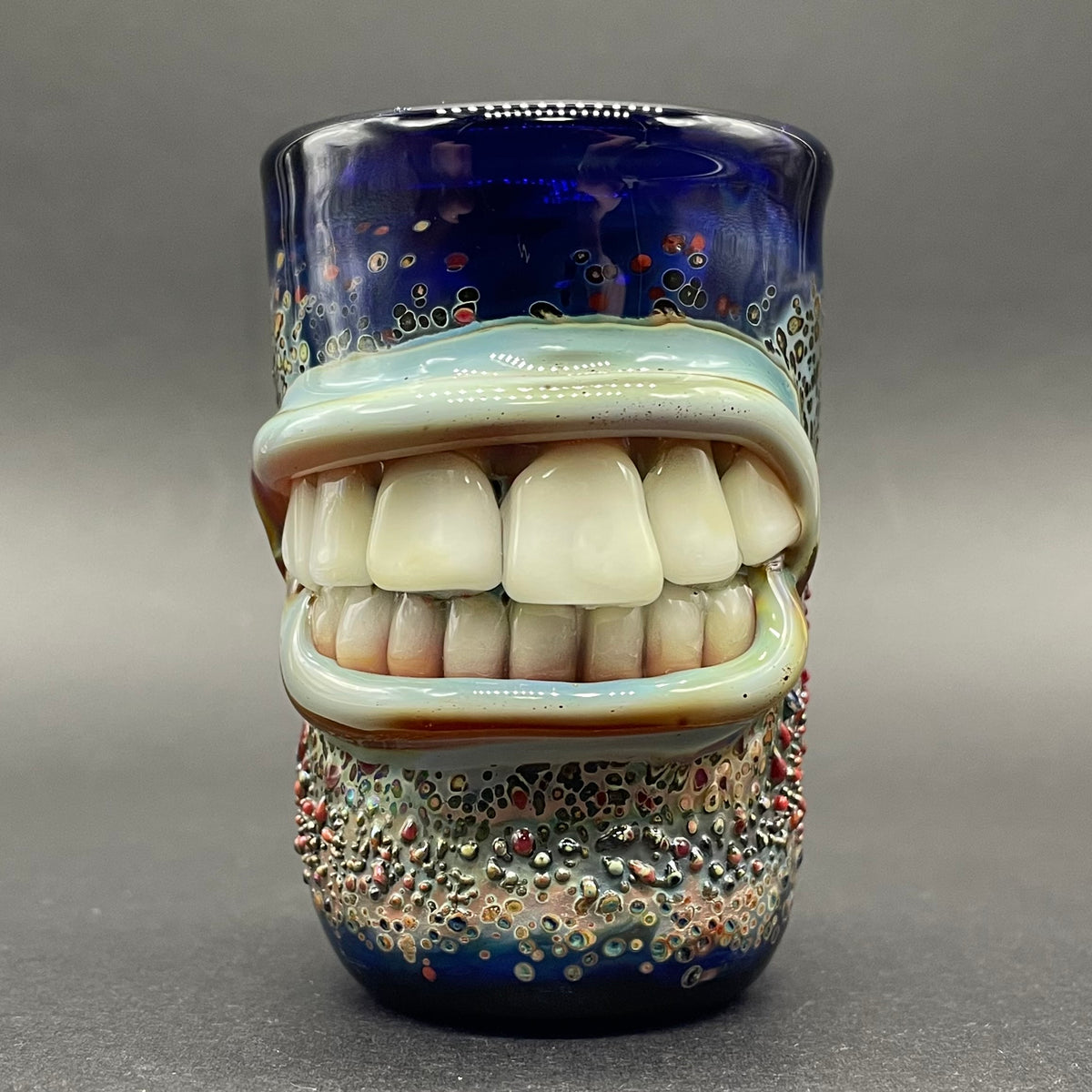 Close-up of MOUTH shot glass - handcrafted glass