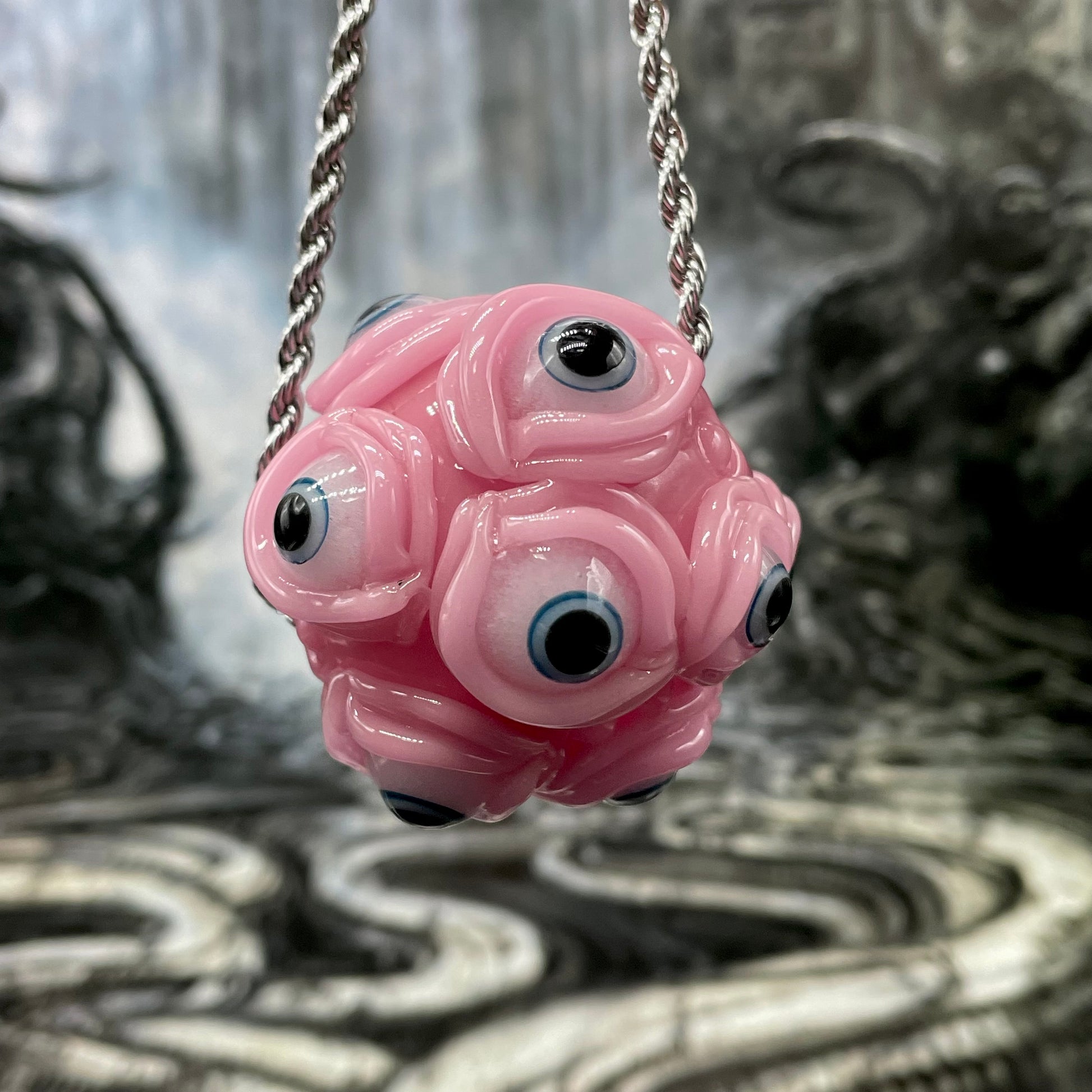 Close-up of Pink Argus pendant - handcrafted glass