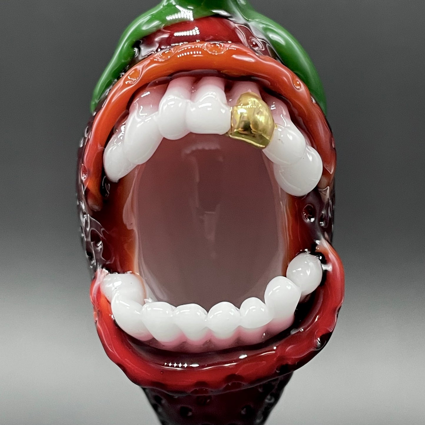 Screaming strawberry glass pendant