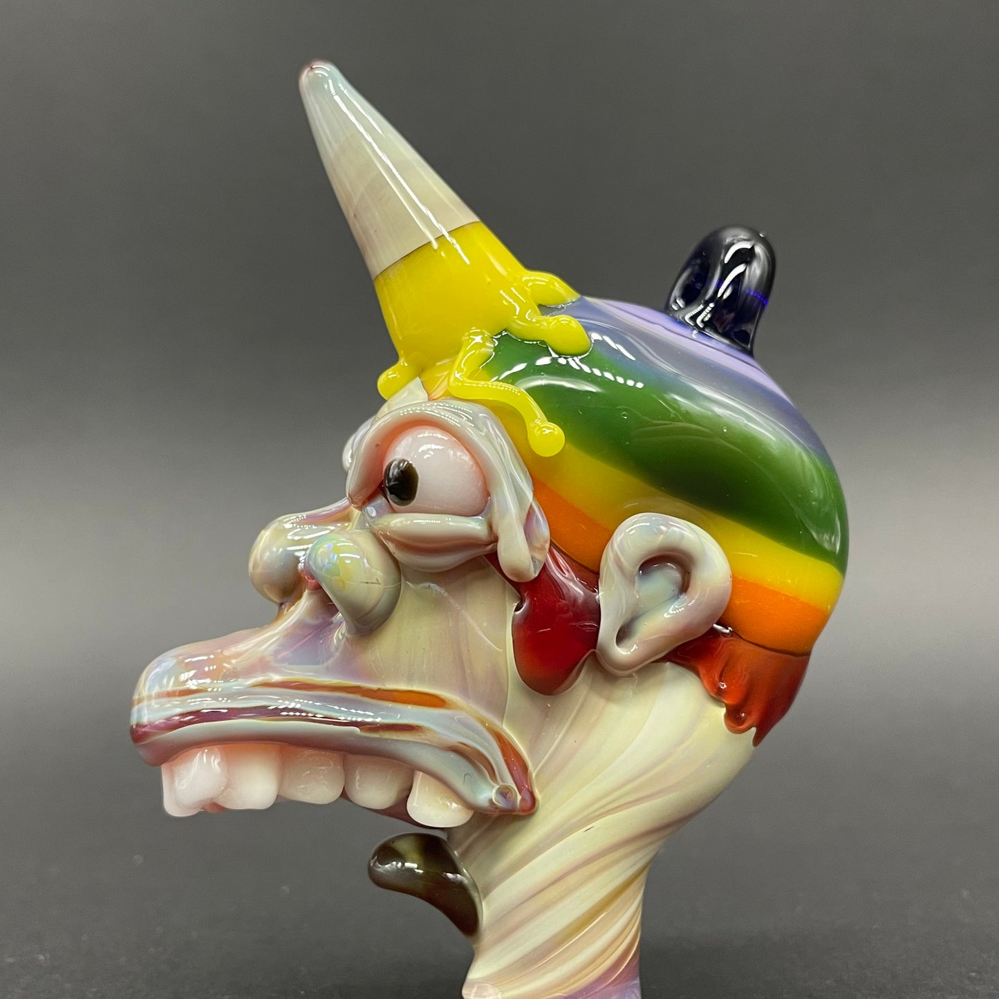 Close-up of Ice cream kid glass pendant - handcrafted glass