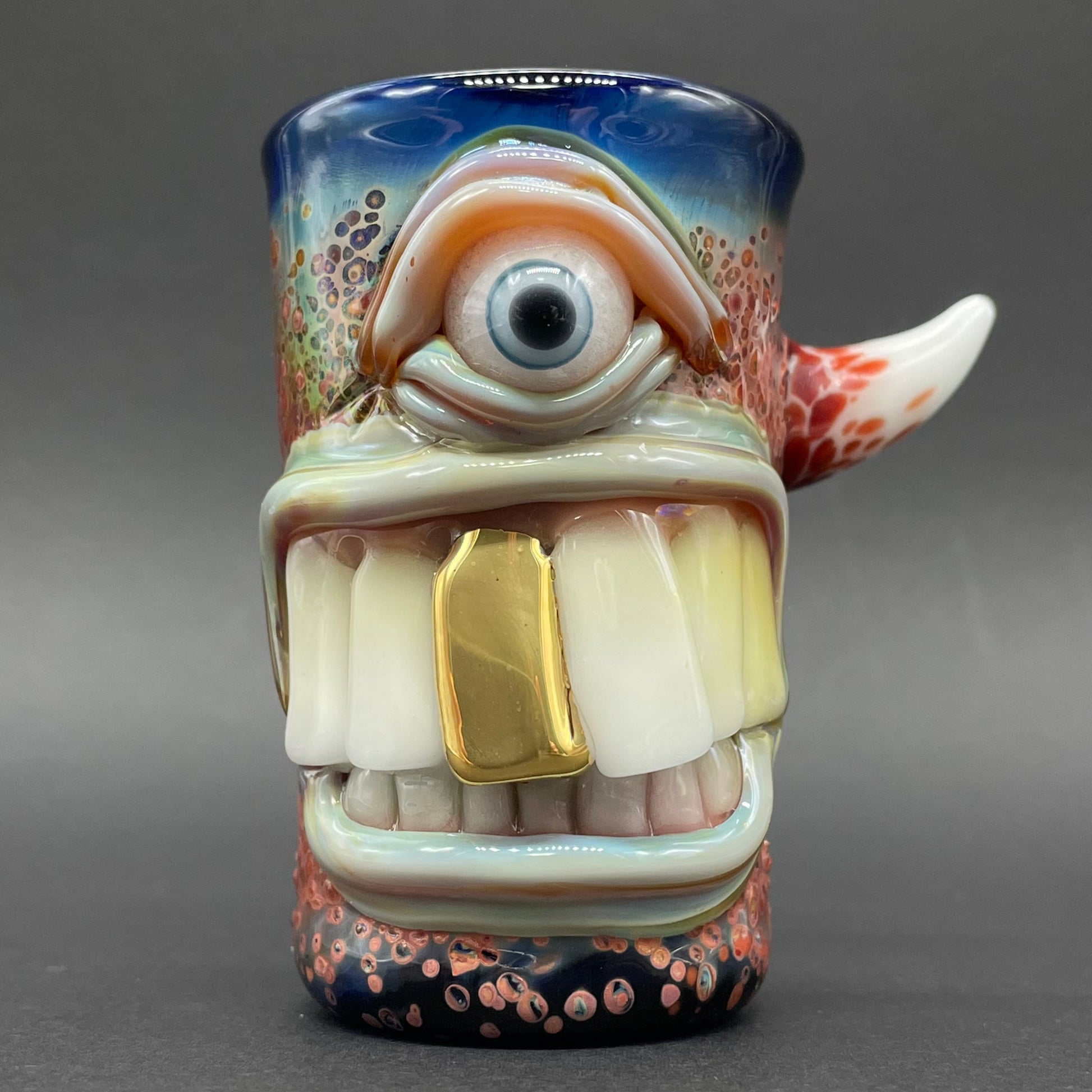Big tooth Cyclops shot glass detail view - premium glass art