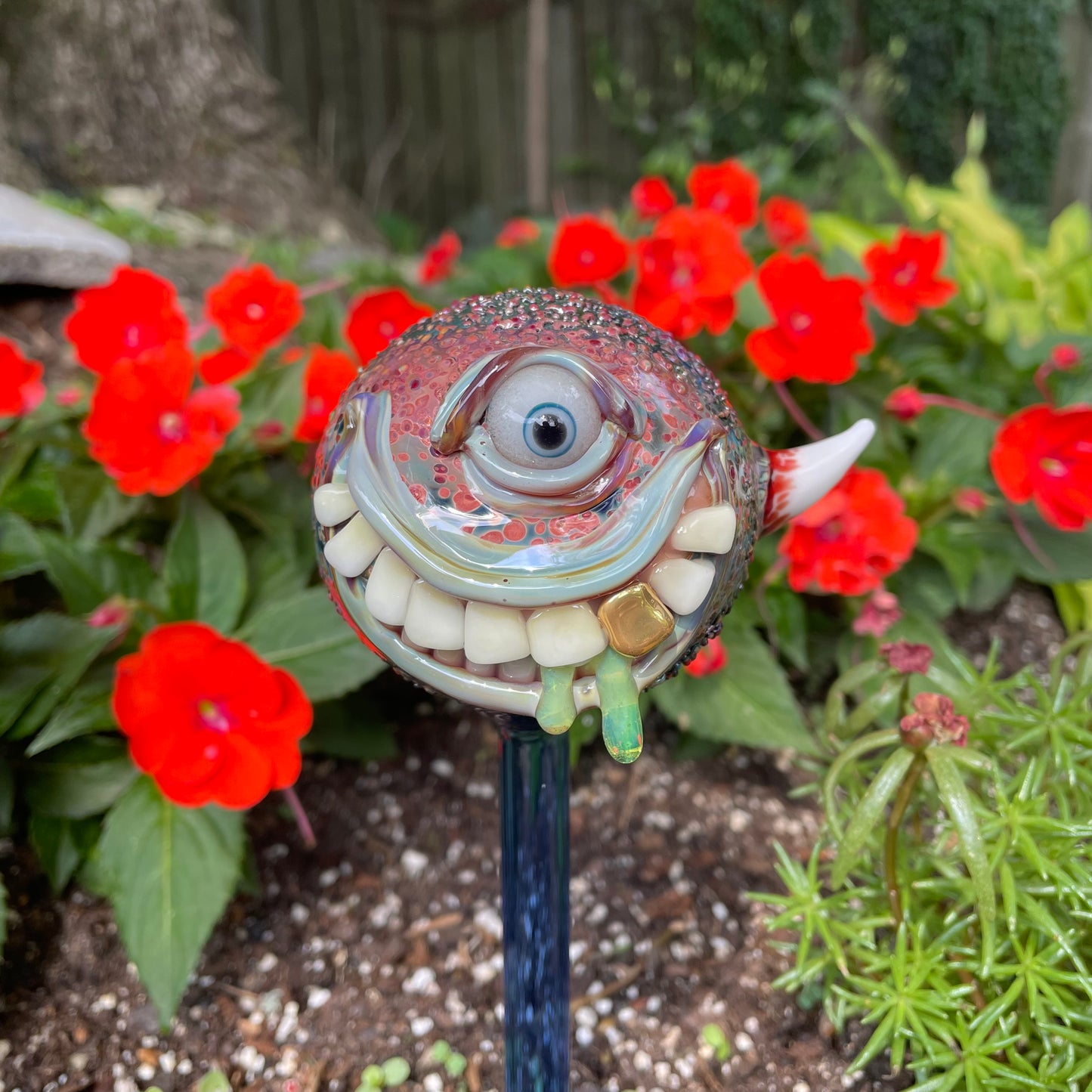 Hand blown glass monster watering globe