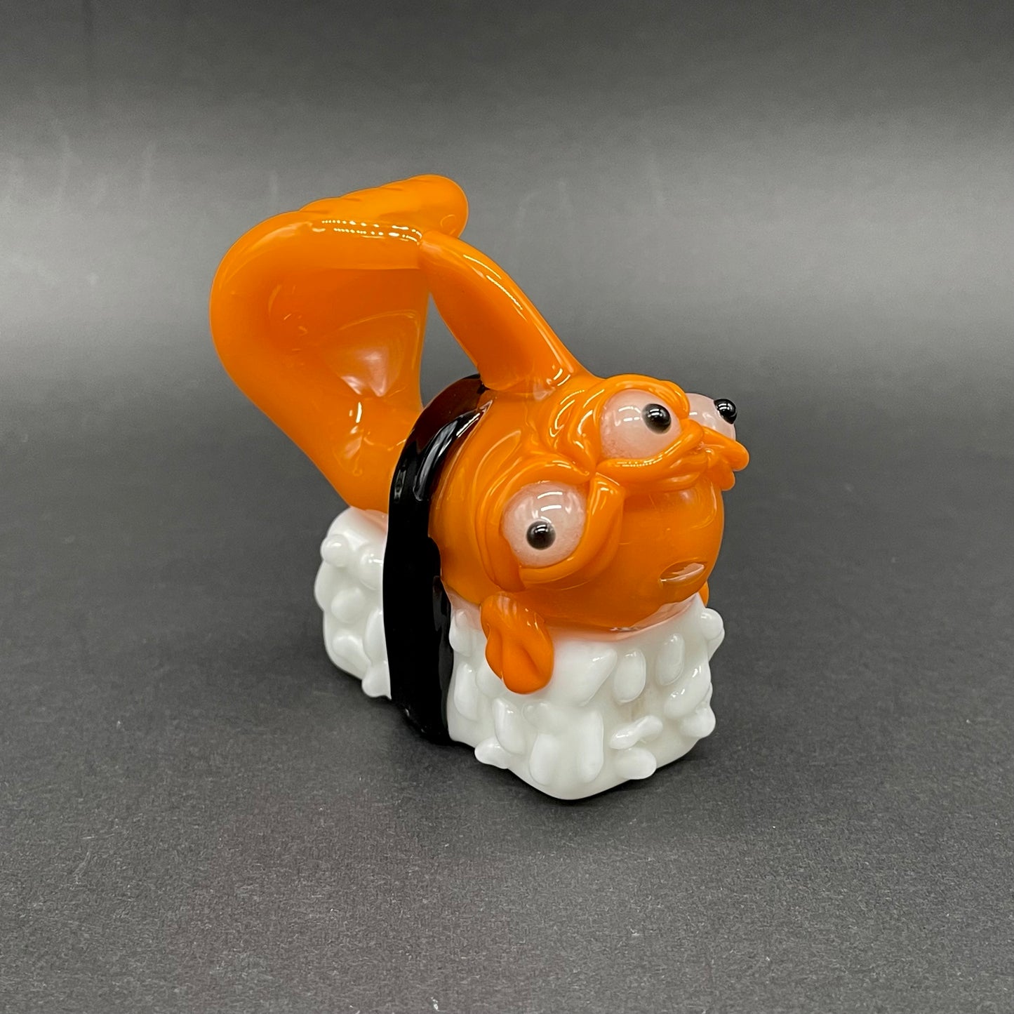 Mutant three eyed fish sushi glass pendant