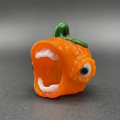 Hand-blown glass screaming jack-o’-lantern by Leviathan Glass