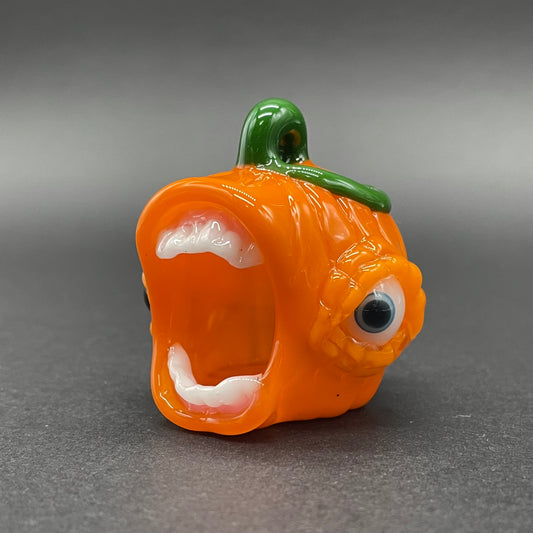 Hand-blown glass screaming jack-o’-lantern by Leviathan Glass