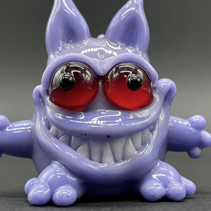Close-up of Gengar Pokémon glass pendant - handcrafted glass