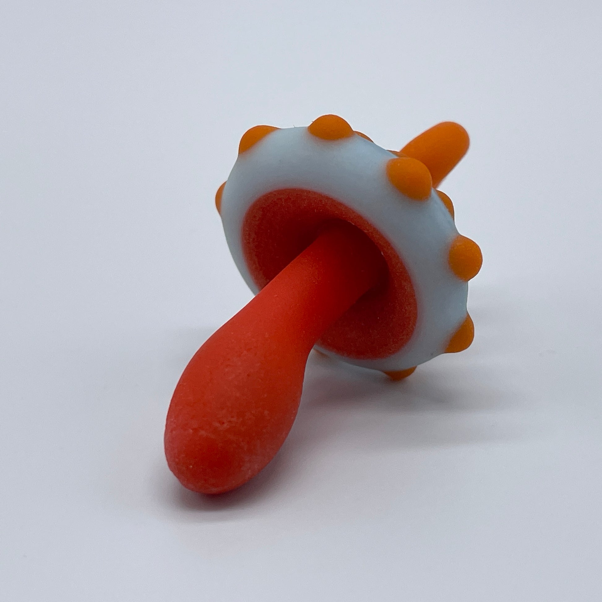 Close-up of Orange mushroom pendant - handcrafted glass