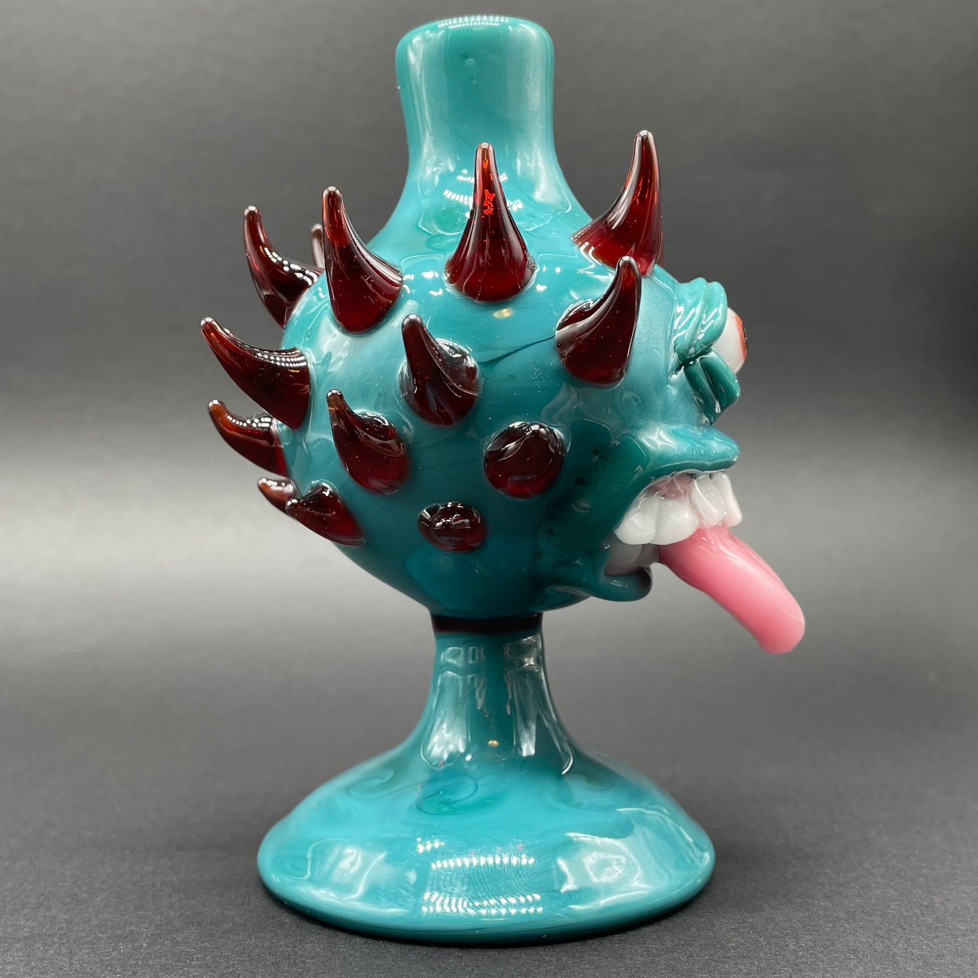 Close-up of Tongue downdraft incense burner - handcrafted glass
