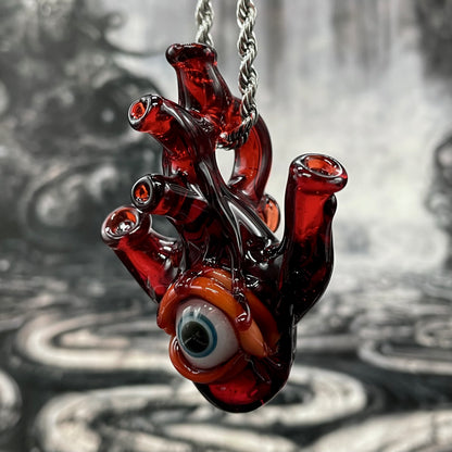 Anatomical cyclops heart pendant detail view - premium glass art