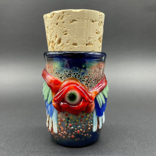 Winged phoenix cork jar detail view - premium glass art