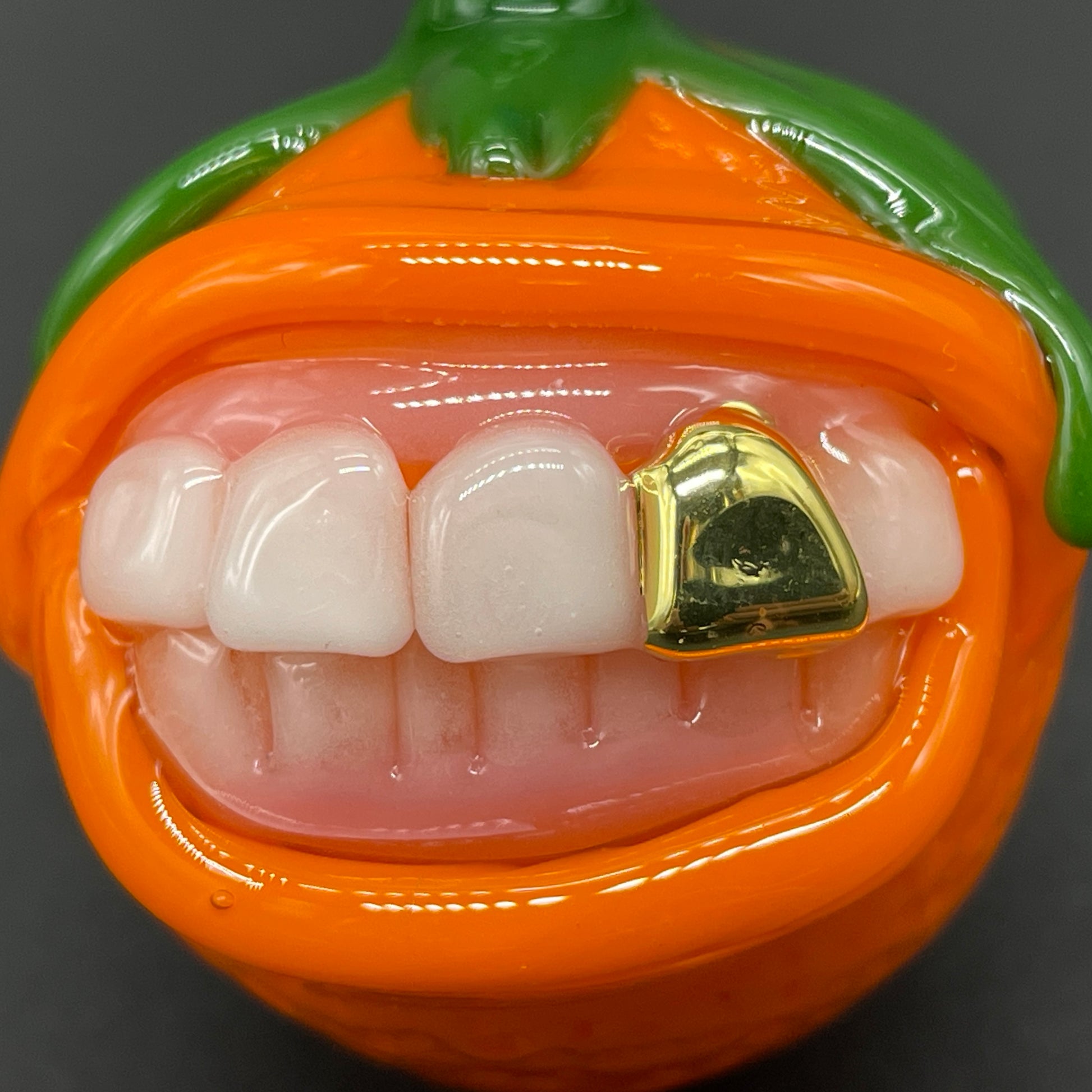 Toothy orange pendant craftsmanship - artisan glass work