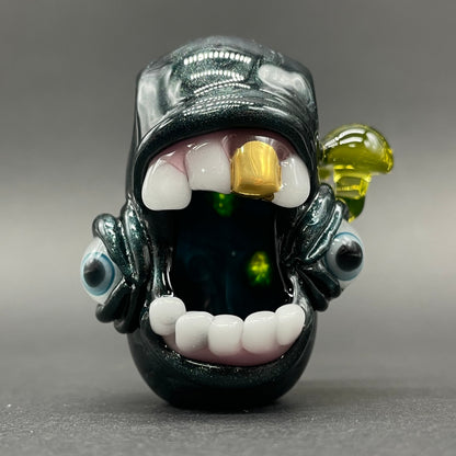 Screaming UV reactive mushroom monster pendant detail view - premium glass art