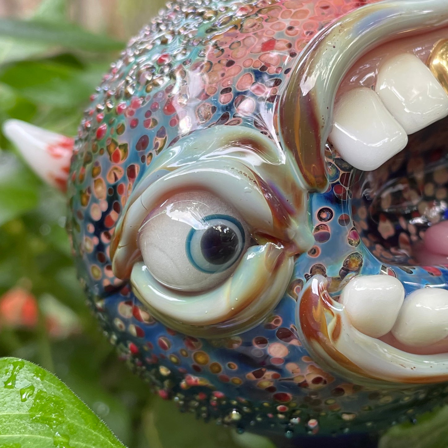 Hand blown glass monster watering globe
