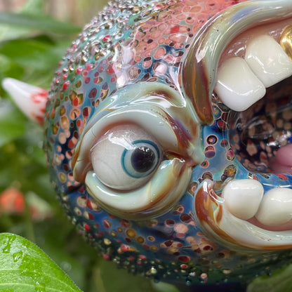 Hand blown glass monster watering globe