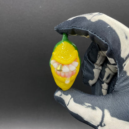 Grinning lemon pendant