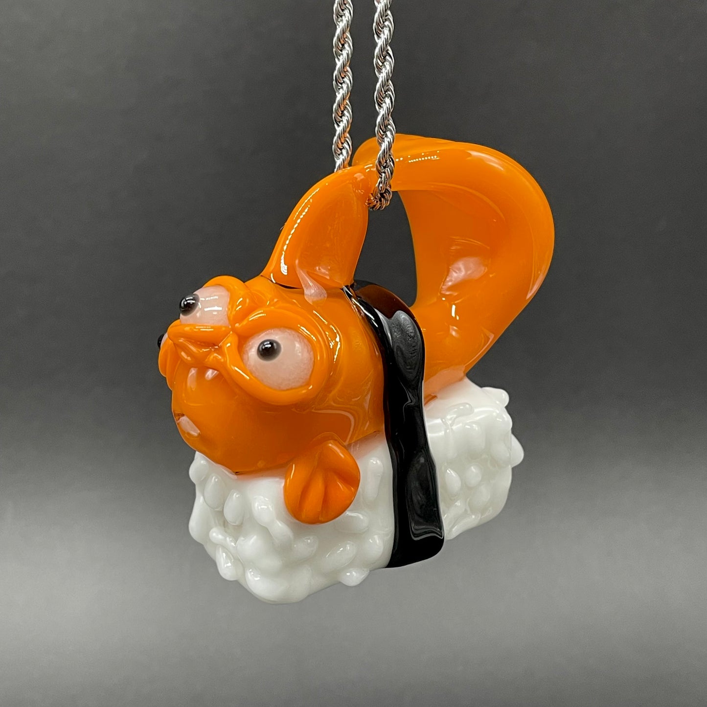 Mutant three eyed fish sushi glass pendant