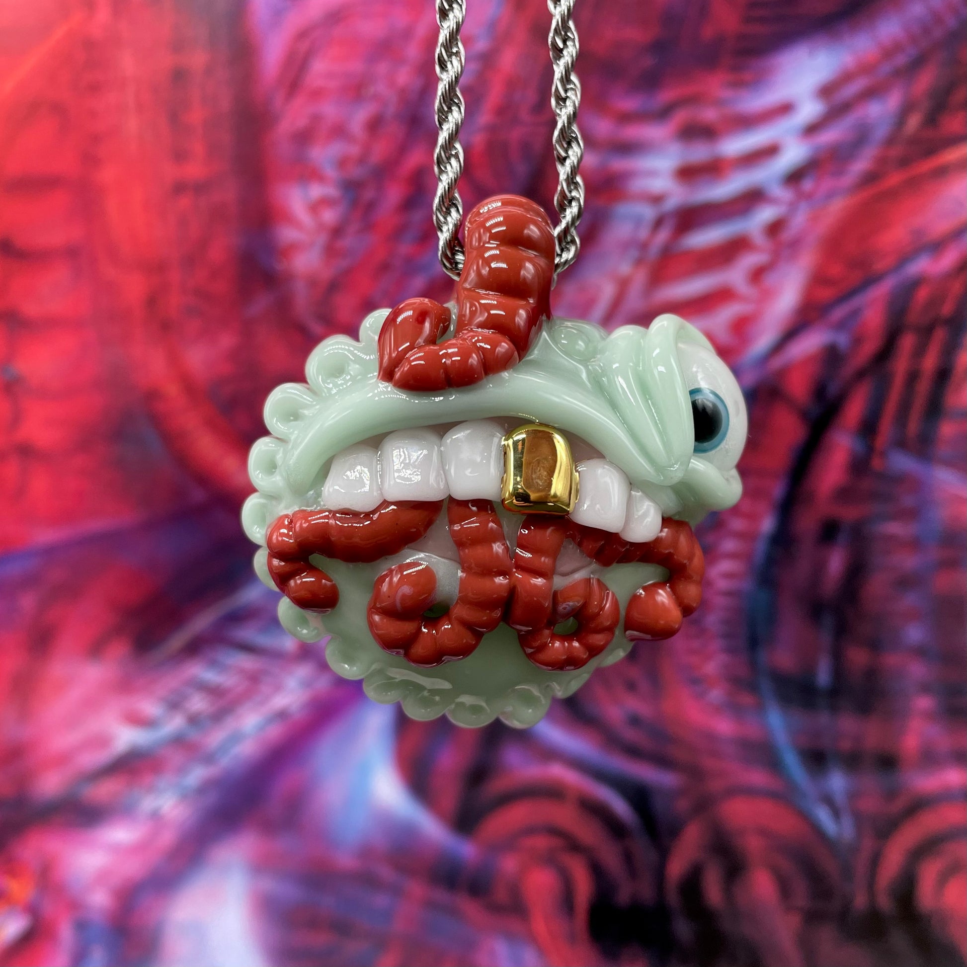 Hand-blown glass Worm eater pendant by Leviathan Glass