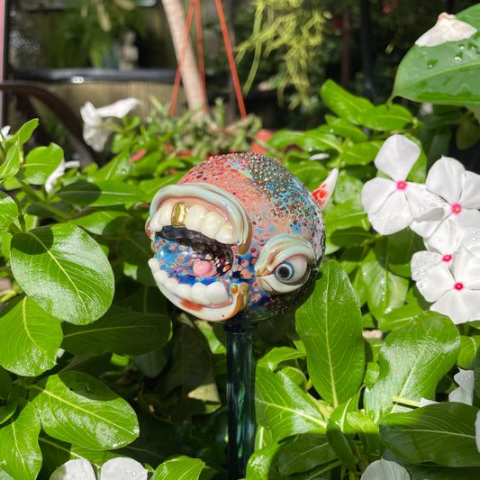 Hand blown glass monster watering globe