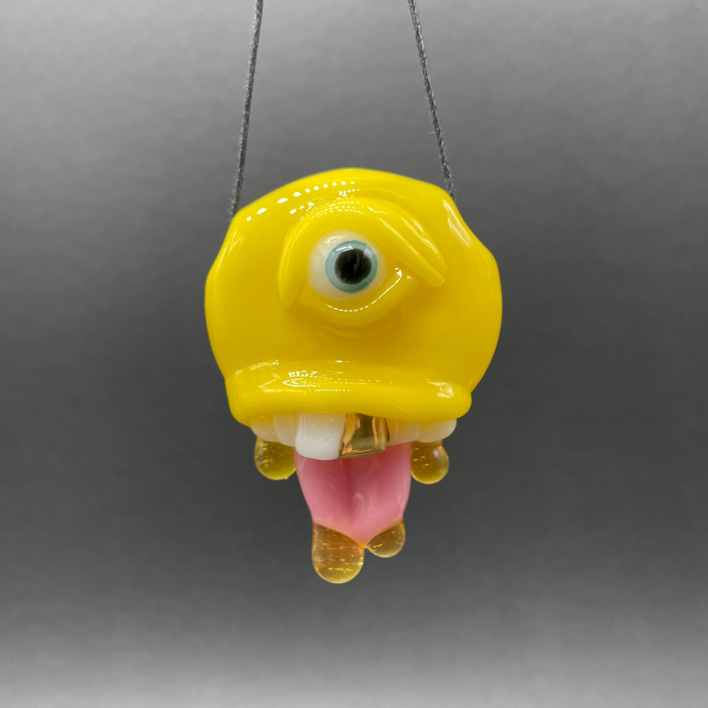 Hand-blown glass Have a nice day glass pendant by Leviathan Glass