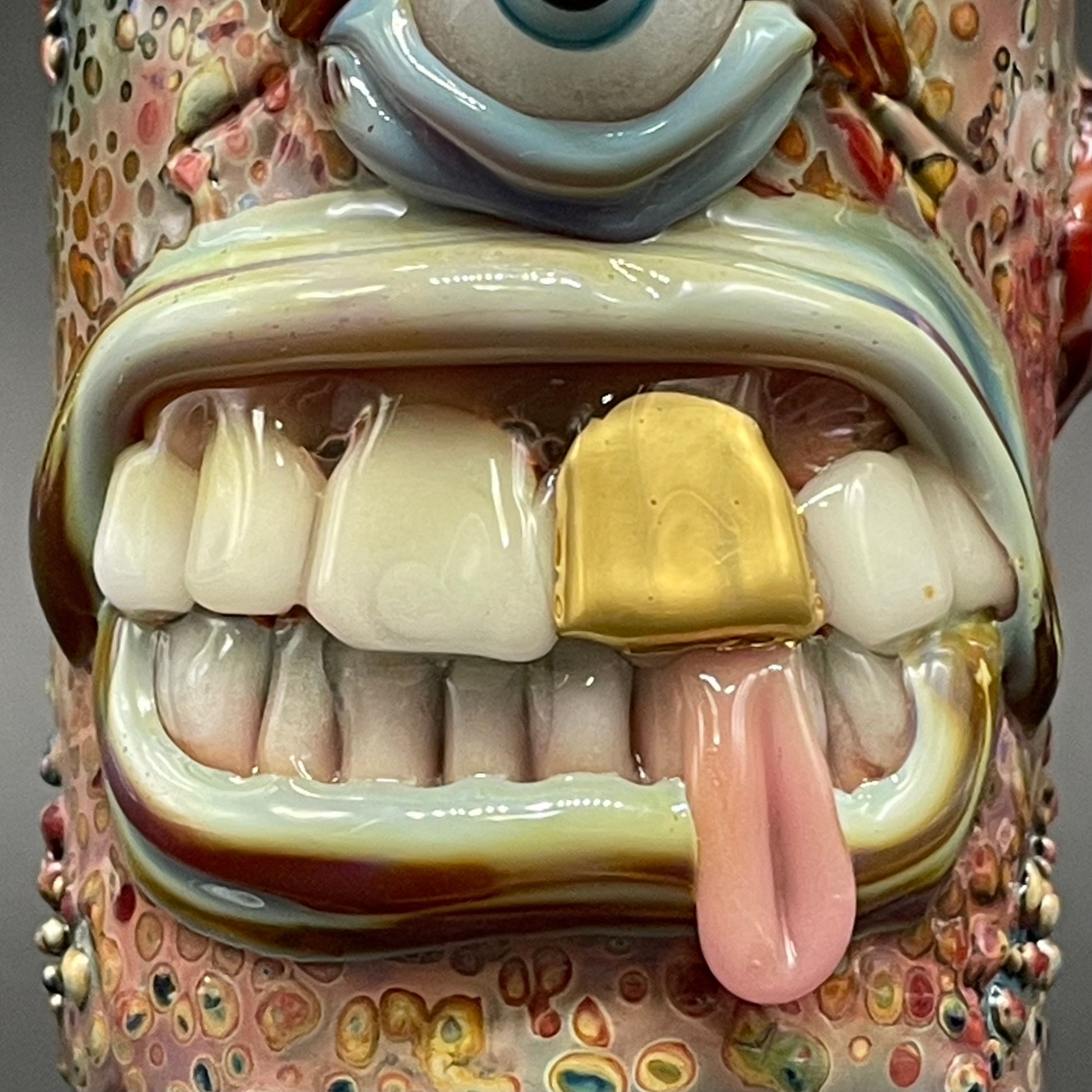 Close-up of Cyclops cork jar - handcrafted glass