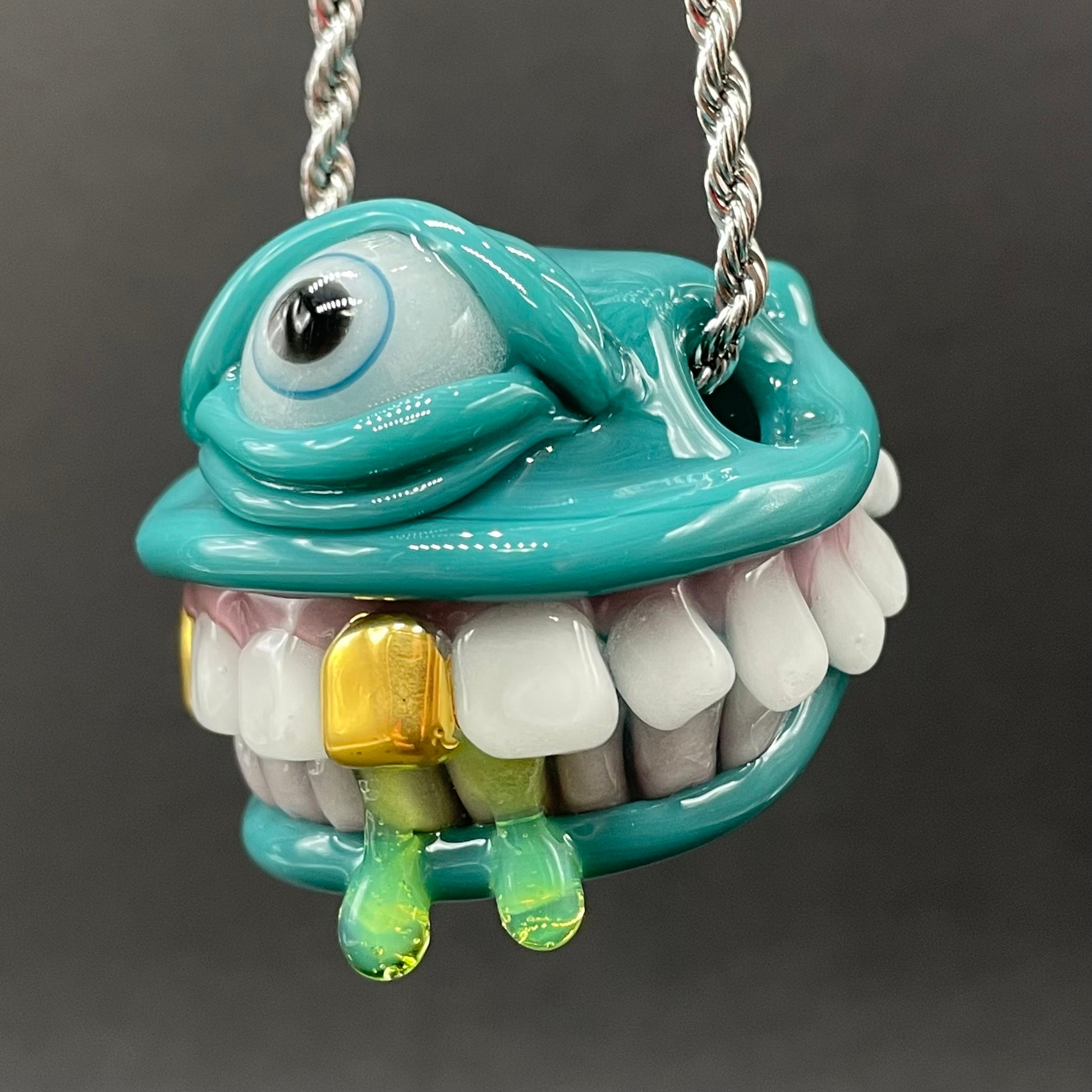 Grinning Like a Fool handblown glass pendant - oversized grinning monster face, white teeth, gold tooth, opal accents, silver rope chain - Leviathan Glass