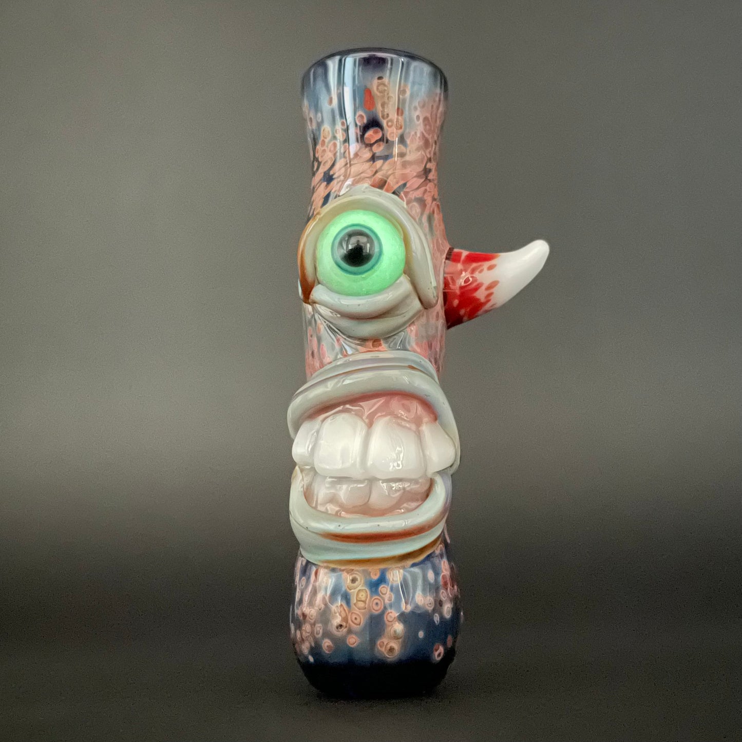 Frit Cyclops Chillum detail view - premium glass art