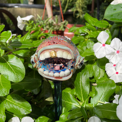 Hand blown glass monster watering globe