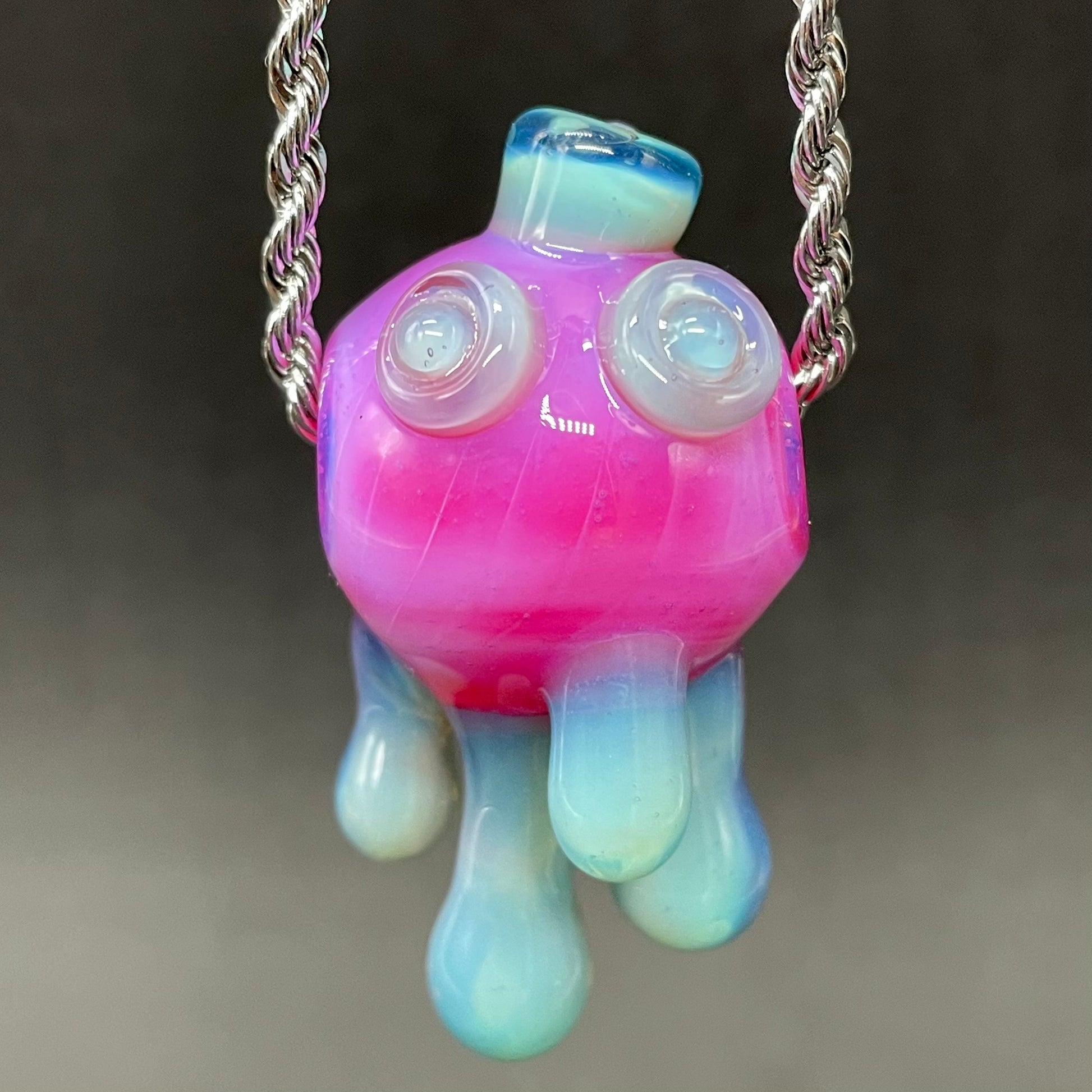 Drippy cyclops glass pendant by Leviathan Glass - artisan detail