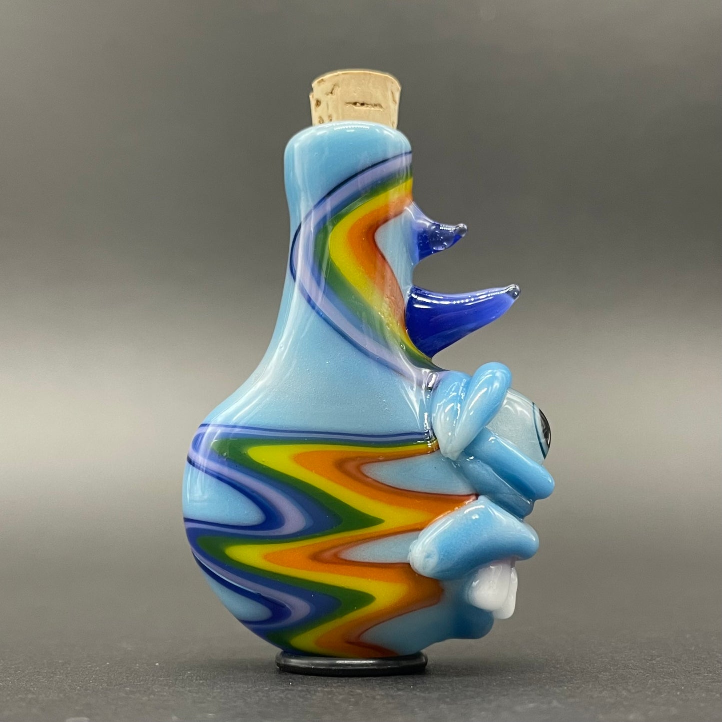 Close-up of Rainbow cork bottle pendant - handcrafted glass