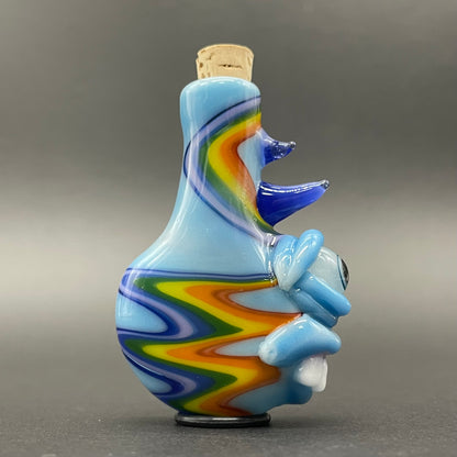 Close-up of Rainbow cork bottle pendant - handcrafted glass