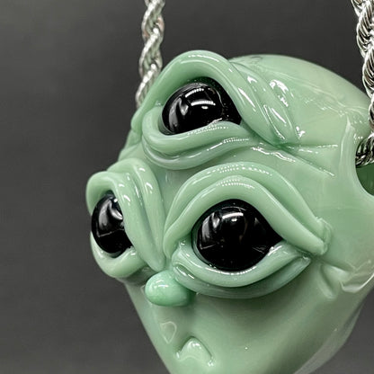 Time manipulating three eye glass alien pendant