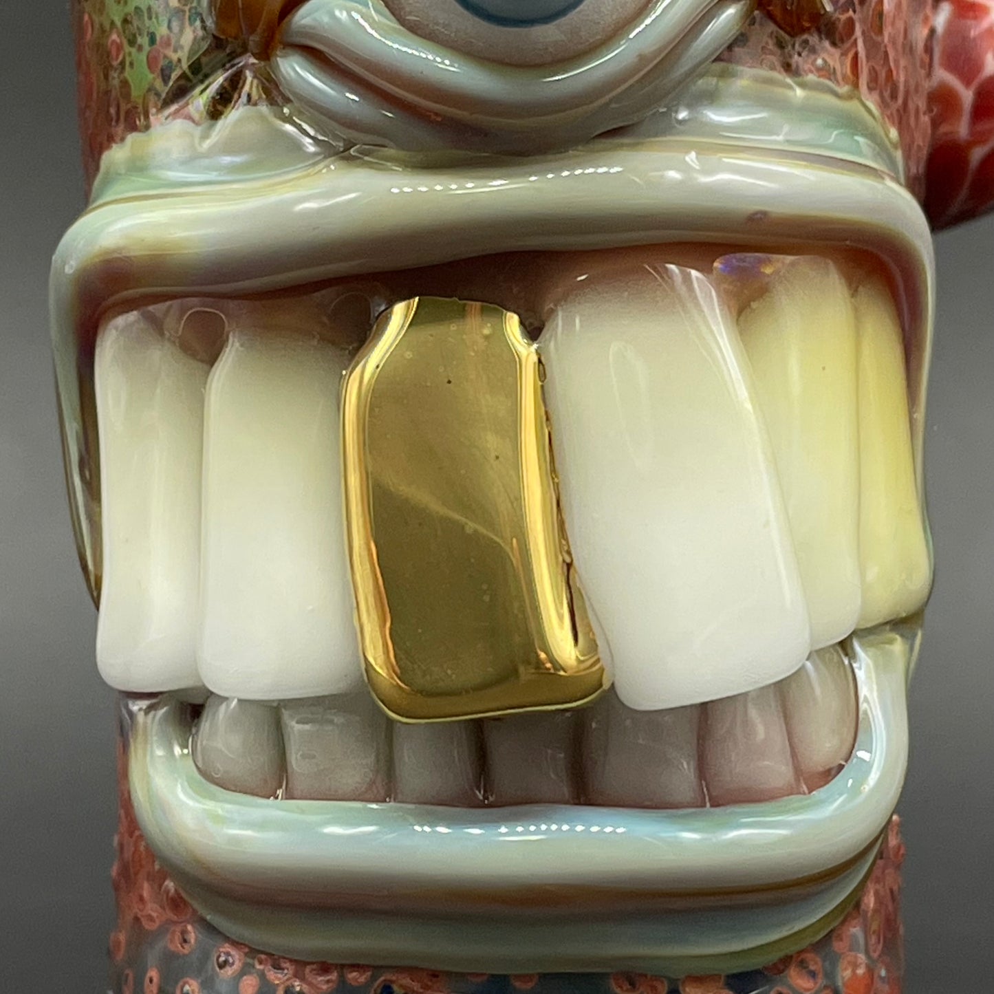 Close-up of Big tooth Cyclops shot glass - handcrafted glass